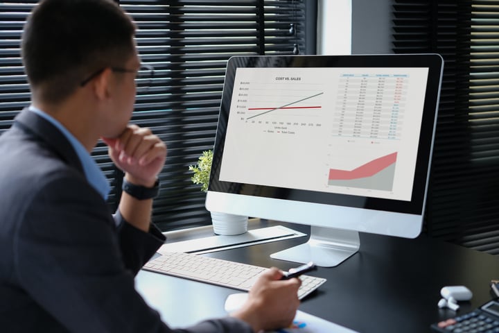 business professional reviewing his dashboard